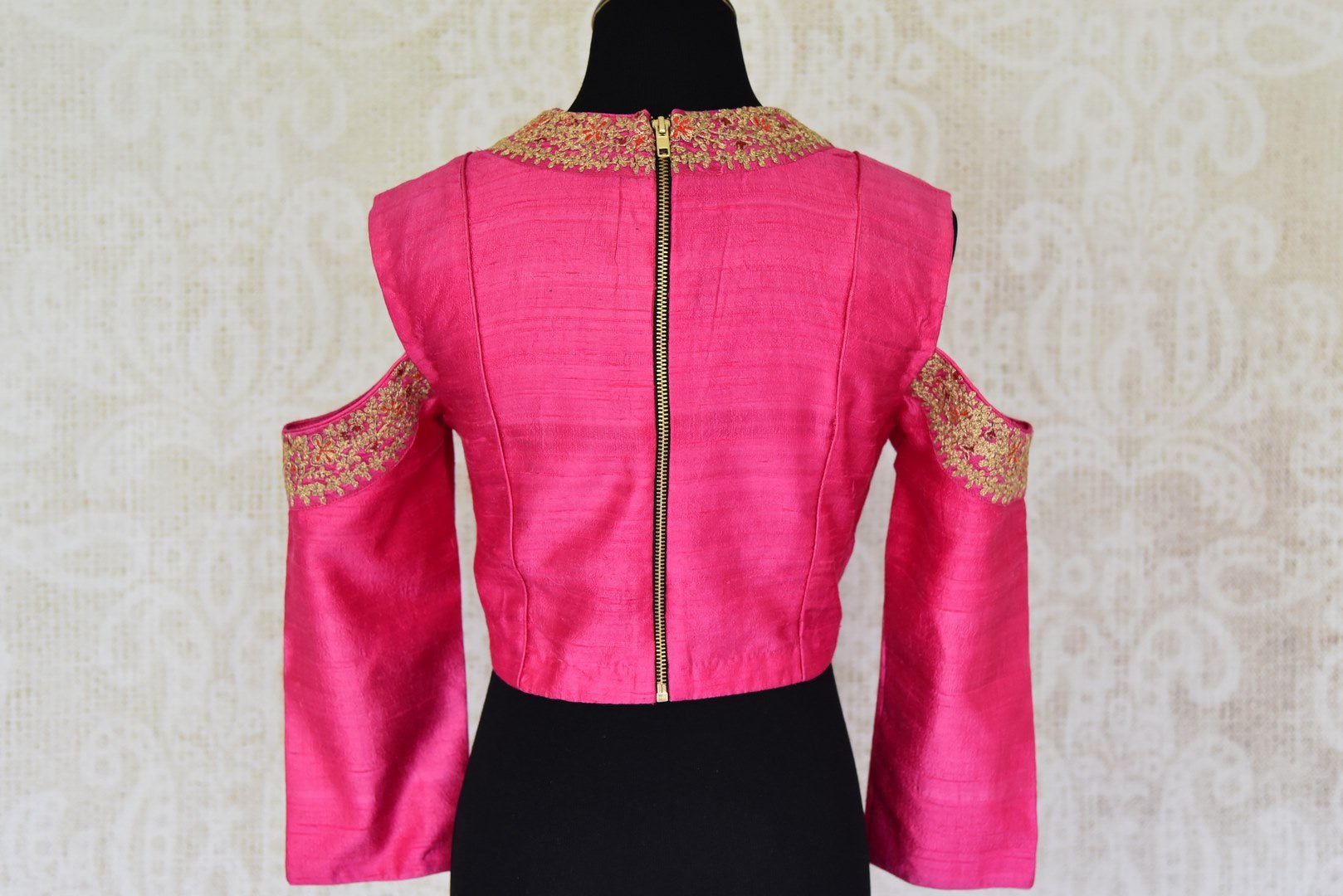 Buy fuschia pink embroidered cold shoulder silk saree blouse online in USA. For Indian women in USA, Pure Elegance fashion store brings an alluring collection of readymade saree blouses to match your beautiful Indian sarees. Shop now at our online store.-back
