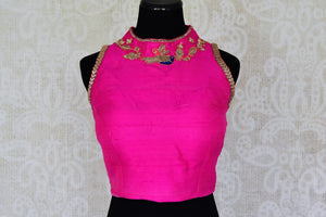 Buy hot pink embroidered sleeveless silk blouse with high neck online in USA. For Indian women in USA, Pure Elegance fashion store brings an alluring collection of readymade saree blouses to match your beautiful Indian sarees. Shop now at our online store.-front