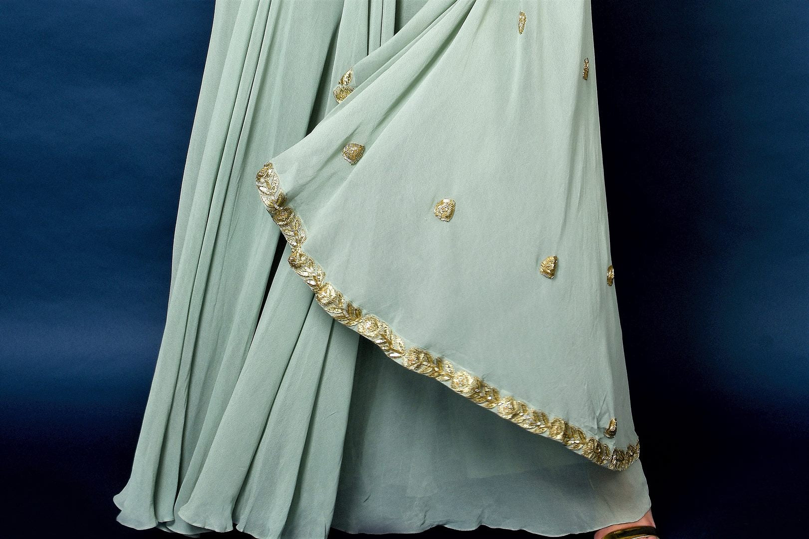 Shop sage green flared pants with embroidered blouse and cape online in USA. Elevate your ethnic style with a stunning range of Indian designer dresses from Pure Elegance Indian fashion store in USA. You can also shop the same collection from our online store.-cape