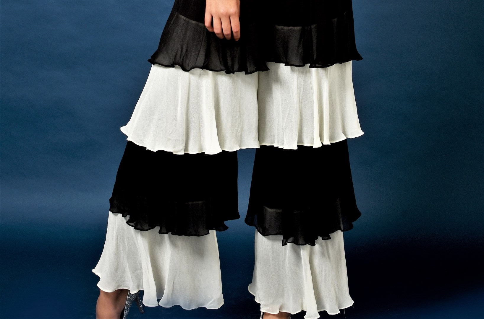Buy black crop top with layered gypsy pants online in USA and embroidered jacket. Elevate your ethnic style with a stunning range of Indian designer dresses from Pure Elegance Indian fashion store in USA. You can also shop the same collection from our online store.-pants