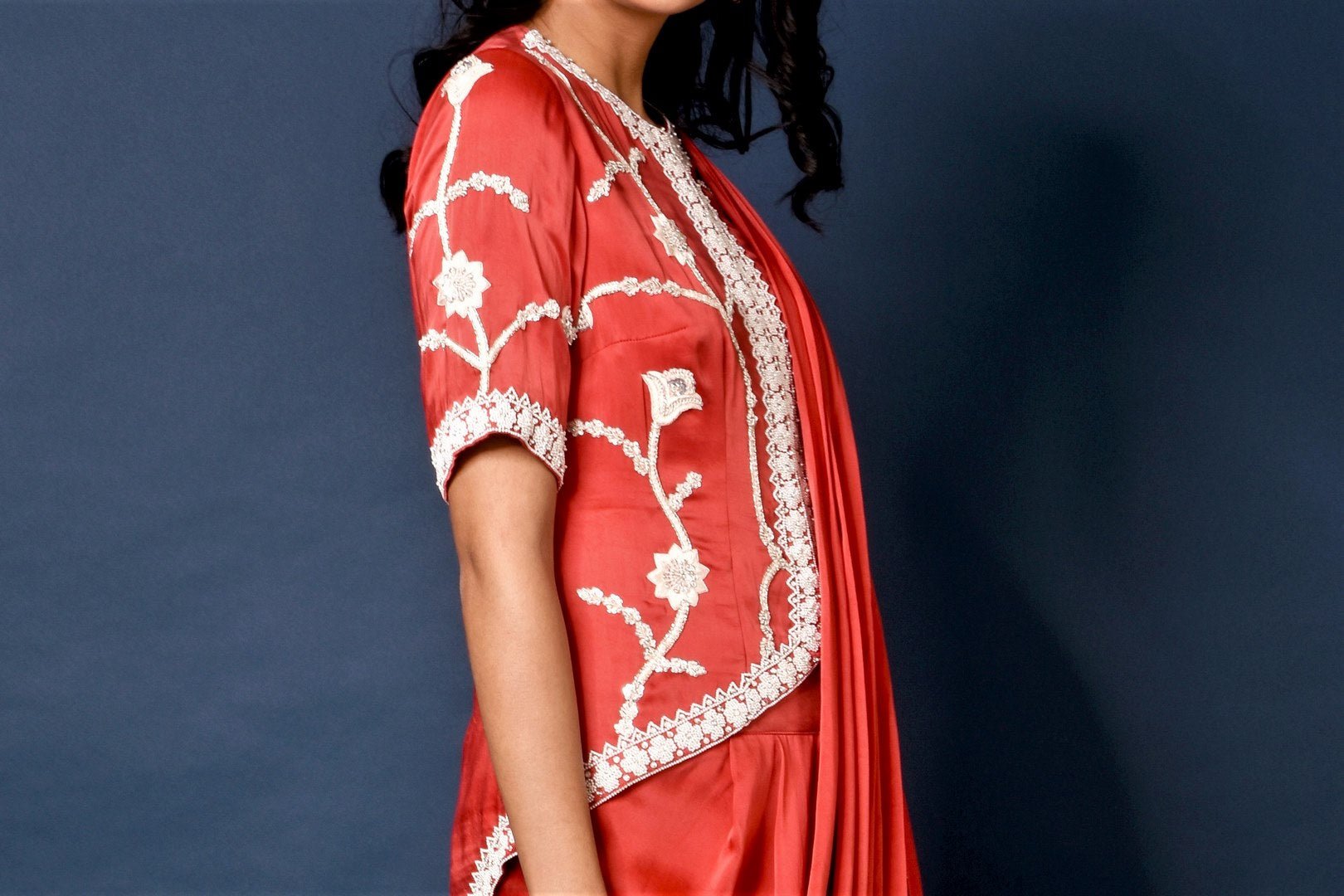 Buy red embroidered jacket with dhoti pants online in USA and attached saree drape. Elevate your ethnic style with a stunning range of Indian designer dresses from Pure Elegance Indian fashion store in USA. You can also shop the same collection from our online store.-jacket