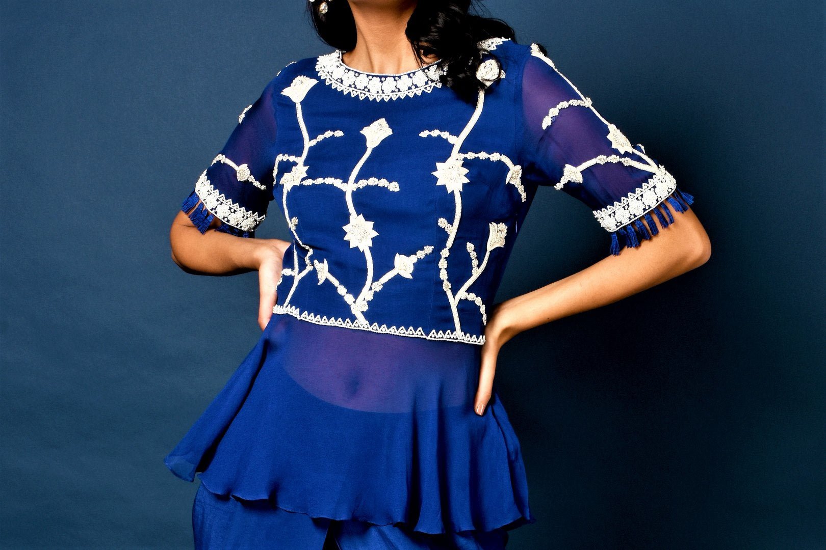 Buy blue embroidered top with dhoti pants online in USA. Elevate your ethnic style with a stunning range of Indian designer dresses from Pure Elegance Indian fashion store in USA. You can also shop the same collection from our online store.-top