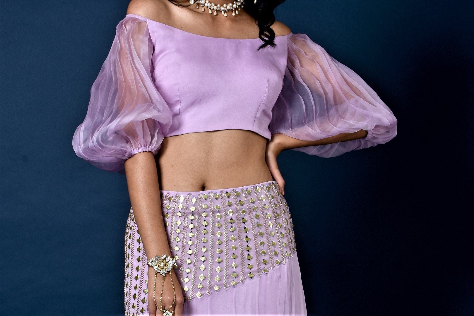 Buy lavender color organza top with mirror work skirt online in USA. Elevate your style with a stunning range of designer dresses, designer gowns, designer Anarkali suits from Pure Elegance Indian fashion store in USA. You can also shop the same collection from our online store.-top