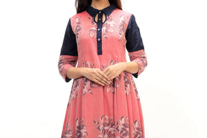 Buy red color Jamdani flared dress with navy blue sleeves online in USA and woven rose motifs. Keep your wardrobe updated with a range of stylish Indian designer dresses from Pure Elegance fashion store in USA. A stylish range of Indian clothing, suits, Indowestern dresses are available at our online store to elevate your style.-front