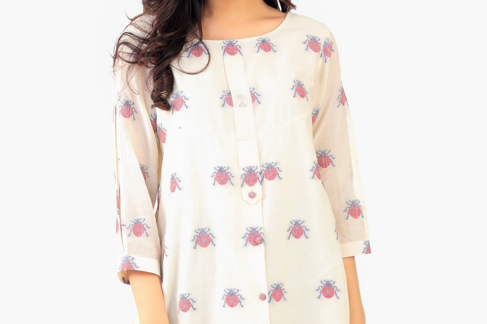 Buy white jamdani cotton shirt online in USA with woven lady bug motifs. Keep your wardrobe updated with a range of stylish Indian designer dresses from Pure Elegance fashion store in USA. A stylish range of Indian clothing, suits, Indowestern dresses are available at our online store to elevate your style.-front