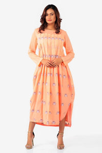 Shop tangerine color jamdani cotton dress with front pleats online in USA. Keep your everyday style chic and up to date with a stylish range of Indian designer dresses from Pure Elegance fashion store in USA.-full view