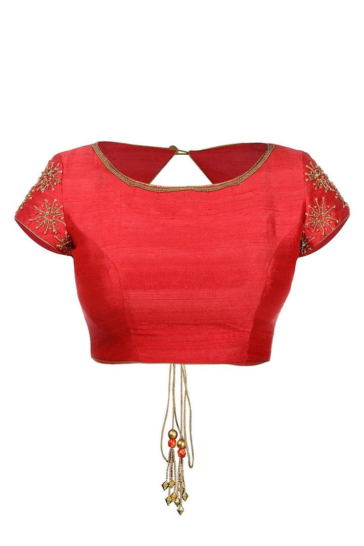 Shop reddish pink raw silk embroidered saree blouse online in USA at Pure Elegance fashion store. Choose from a range of exquisite designer saree blouses perfect to amp up your saree style. also available at our online store.-full view