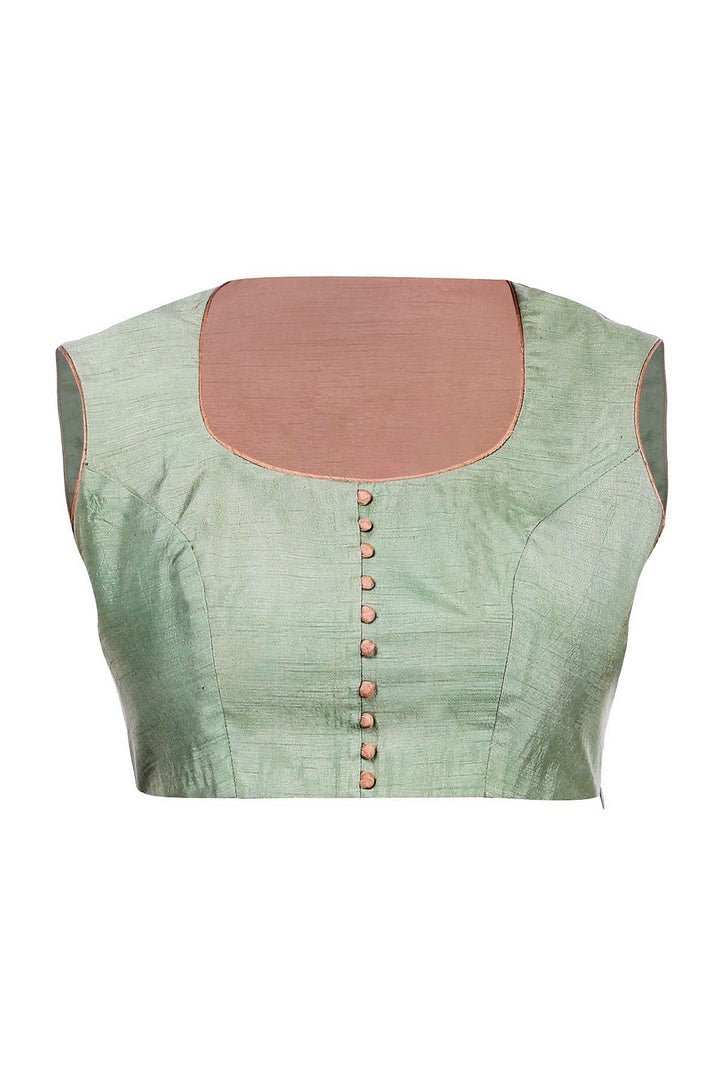 Shop pista green embroidered sleeveless raw silk saree blouse online in USA from Pure Elegance fashion store. Choose from a range of exquisite readymade designer sari blouses perfect to amp up your saree style. also available at our online store.-full view
