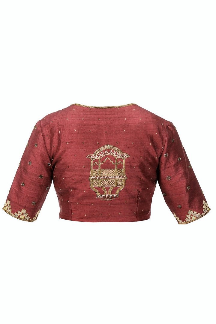 Buy burgundy color zardozi embroidery raw silk saree blouse online in USA from Pure Elegance fashion store. Choose from a range of exquisite readymade designer sari blouses perfect to amp up your saree style. also available at our online store.-back