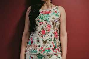 Buy off-white embroidered spaghetti top with flared palazzo online in USA. Pick your favorite Indian dresses from Pure Elegance clothing store in USA. Step up your style with a range of Indian designer dresses, suits, designer lehengas also available on our online store.-top