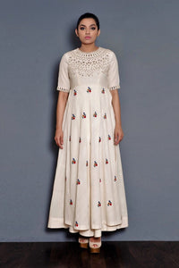 Buy off-white full length dress online in USA with parsi and mirror embroidery. Pick your favorite Indian dresses from Pure Elegance clothing store in USA. Step up your style with a range of Indian designer dresses, suits, designer lehengas also available on our online store. -full view