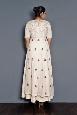 Buy off-white full length dress online in USA with parsi and mirror embroidery. Pick your favorite Indian dresses from Pure Elegance clothing store in USA. Step up your style with a range of Indian designer dresses, suits, designer lehengas also available on our online store. -back