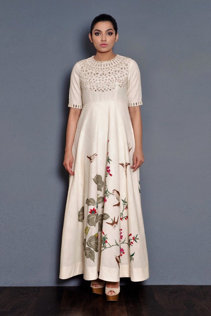 Buy elegant off-white full length dress online in USA with parsi embroidery. Pick your favorite Indian dresses from Pure Elegance clothing store in USA. Step up your style with a range of Indian designer dresses, suits, designer lehengas also available on our online store. -full view