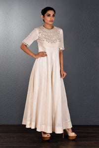 Buy alluring off-white mirror embroidery full length dress online in USA. Pick your favorite Indian dresses from Pure Elegance clothing store in USA. Step up your style with a range of Indian designer dresses, suits, designer lehengas also available on our online store. -full view