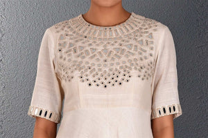 Buy alluring off-white mirror embroidery full length dress online in USA. Pick your favorite Indian dresses from Pure Elegance clothing store in USA. Step up your style with a range of Indian designer dresses, suits, designer lehengas also available on our online store. -top