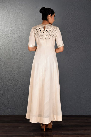 Buy alluring off-white mirror embroidery full length dress online in USA. Pick your favorite Indian dresses from Pure Elegance clothing store in USA. Step up your style with a range of Indian designer dresses, suits, designer lehengas also available on our online store. -back