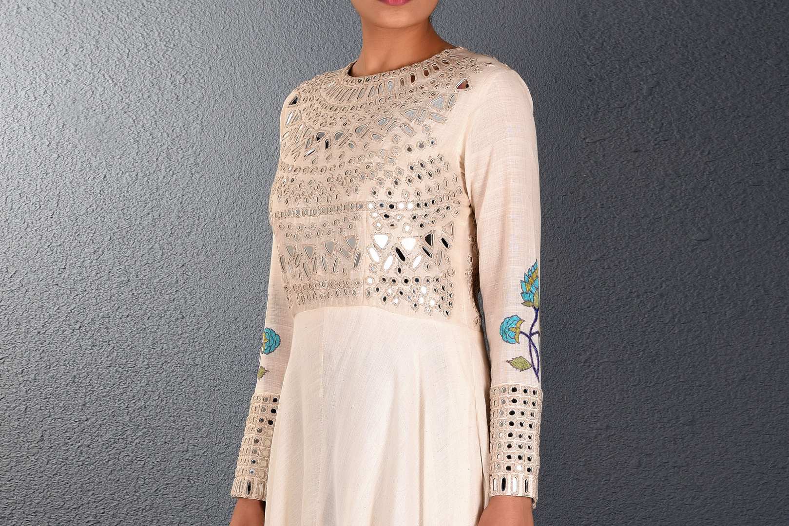 Buy alluring off-white mirror and aari embroidery full length dress online in USA. Pick your favorite Indian dresses from Pure Elegance clothing store in USA. Step up your style with a range of Indian designer dresses, suits, designer lehengas also available on our online store. -top