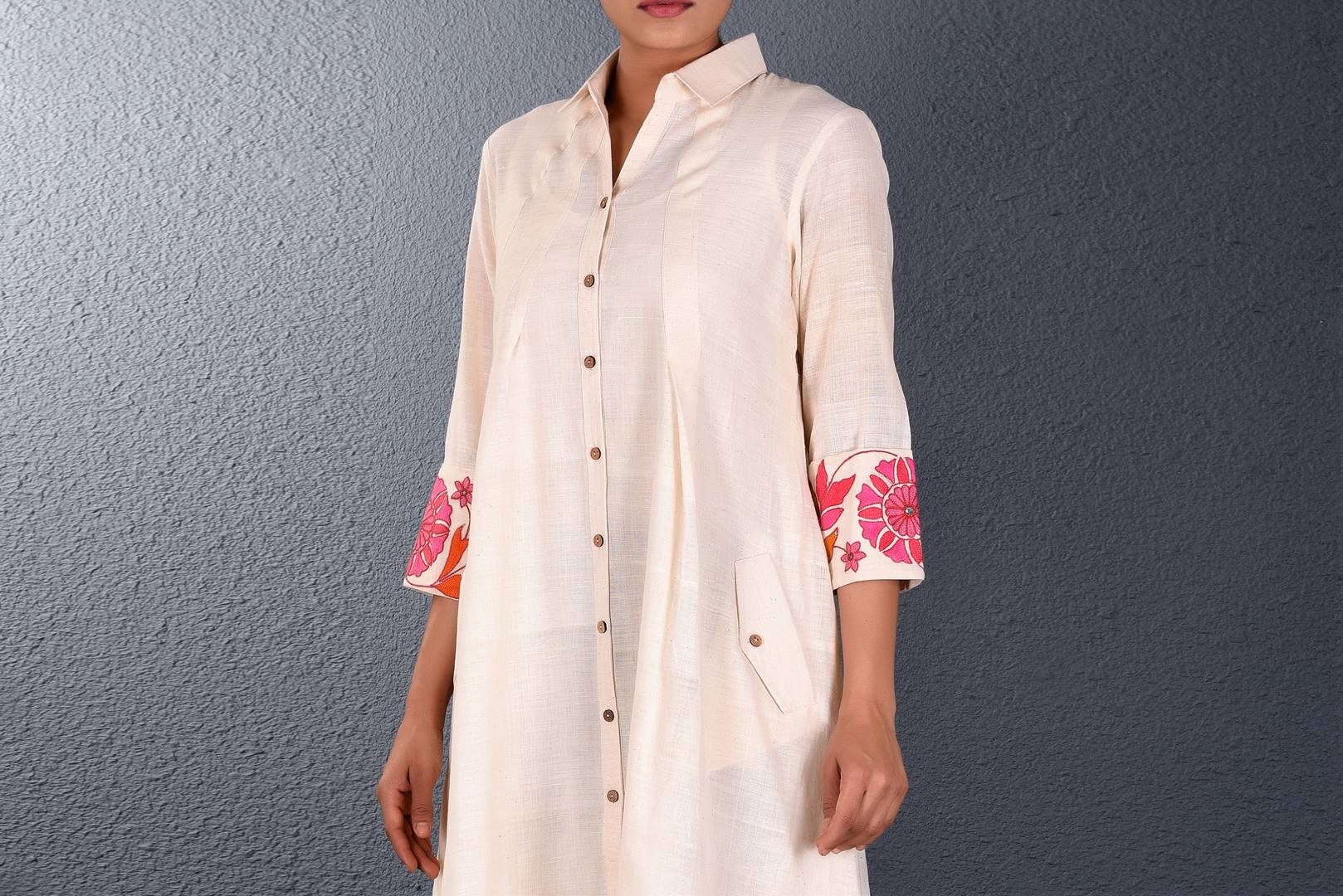Buy off-white embroidered asymmetric shirt dress online in USA. Pick your favorite Indian dresses from Pure Elegance clothing store in USA. Step up your style with a range of Indian designer dresses, suits, designer lehengas also available on our online store. -top
