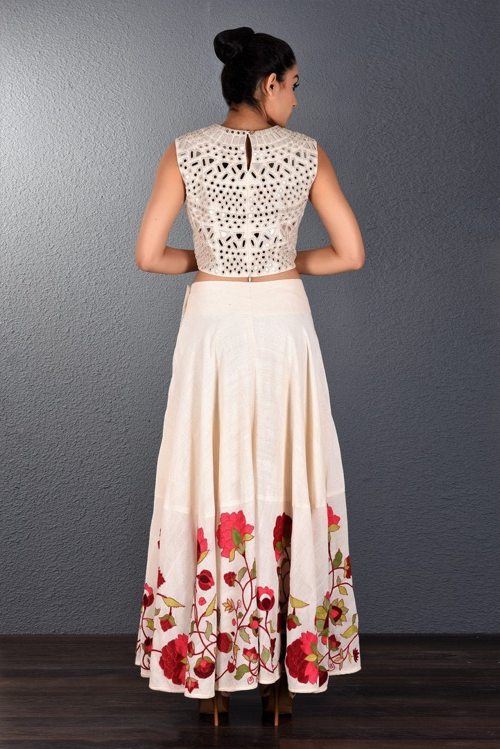 Buy off-white embroidered crop top with aari embroidery skirt online in USA. Pick your favorite Indian designer dresses from Pure Elegance clothing store in USA. Step up your style with a range of Indian designer sarees , suits, designer lehengas also available on our online store. -back