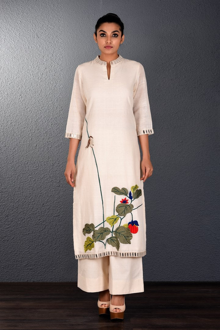 Shop off-white parsi embroidery kurta with straight pants online in USA. Pick your favorite Indian designer dresses from Pure Elegance clothing store in USA. Step up your style with a range of Indian designer sarees , suits, designer lehengas also available on our online store. -full view