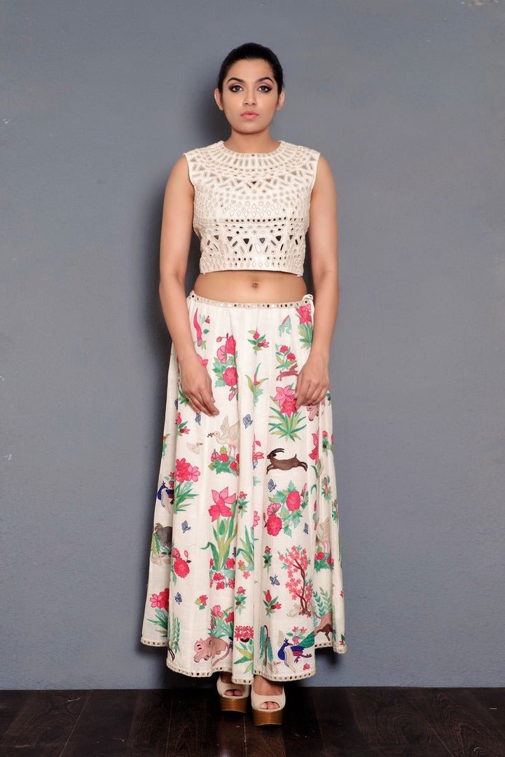 Buy off-white mirror embroidery khadi crop top with skirt online in USA. Pick your favorite Indian designer dresses from Pure Elegance clothing store in USA. Step up your style with a range of Indian designer sarees , suits, designer lehengas also available on our online store. -full view