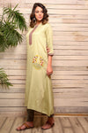 Buy green embroidered cotton kurta with grey pants online in USA. Pick your favorite Indian designer suits and dresses from Pure Elegance clothing store in USA. Make your ethnic collection complete with a range of Indian saris, Anarkali suits, designer lehengas also available on our online store.  -full view