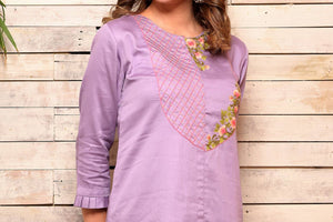 Buy mauve color embroidered hi-low cotton kurta with grey pants online in USA. Pick your favorite Indian designer suits and dresses from Pure Elegance clothing store in USA. Make your ethnic collection complete with a range of Indian saris, Anarkali suits, designer lehengas also available on our online store.  -top