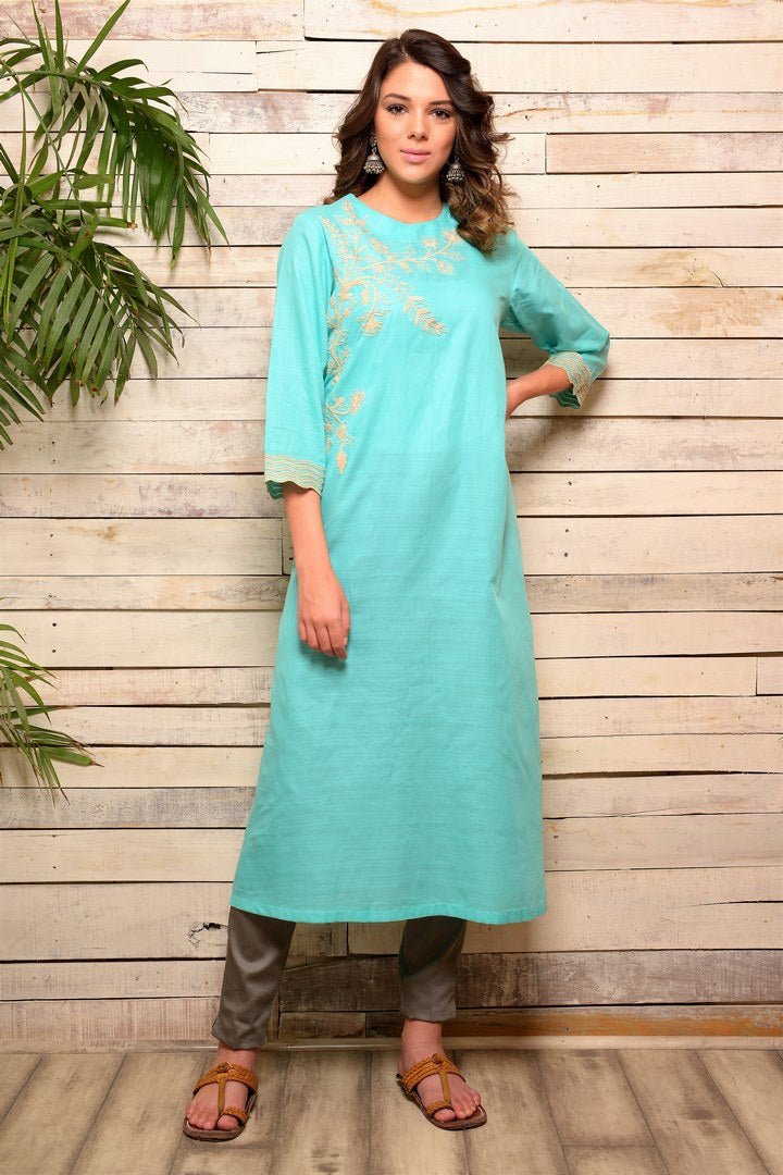Buy aqua blue embroidered cotton kurta with grey pants online in USA. Pick your favorite Indian designer suits and dresses from Pure Elegance clothing store in USA. Make your ethnic collection complete with a range of Indian sarees, Anarkali suits, designer lehengas also available on our online store. -full view