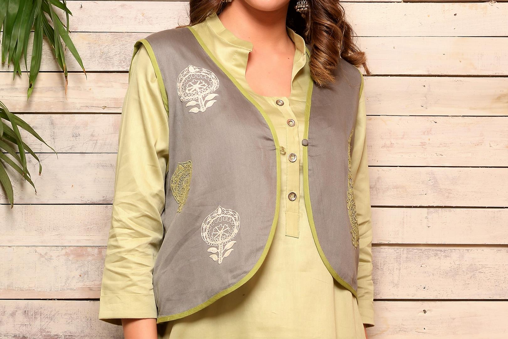 Buy tonal green cotton kurta with embroidered jacket online in USA and pants. Pick your favorite Indian designer suits and dresses from Pure Elegance clothing store in USA. Make your ethnic collection complete with a range of Indian sarees, Anarkali suits, designer lehengas also available on our online store.  -jacket