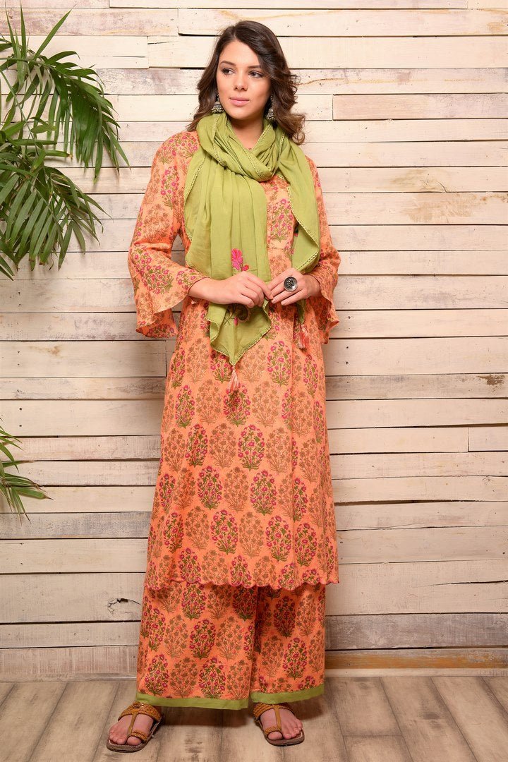 Buy peach printed cotton kurta with palazzo online in USA and green embroidered scarf. Pick your favorite Indian designer suits and dresses from Pure Elegance clothing store in USA. Make your ethnic collection complete with a range of Indian sarees, Anarkali suits, designer lehengas also available on our online store.  -full view