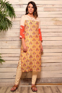 Buy yellow cotton silk kurta with tassel embellished sleeves and slim pants online in USA. Pick your favorite Indian designer suits and dresses from Pure Elegance clothing store in USA. Make your ethnic collection complete with a range of Indian sarees, Anarkali suits, designer lehengas also available on our online store.  -full view
