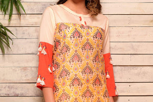 Buy yellow cotton silk kurta with tassel embellished sleeves and slim pants online in USA. Pick your favorite Indian designer suits and dresses from Pure Elegance clothing store in USA. Make your ethnic collection complete with a range of Indian sarees, Anarkali suits, designer lehengas also available on our online store.  -top