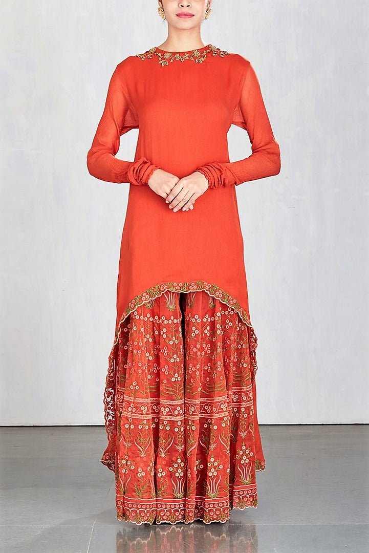 Buy bright red embroidered sharara with high low kurta online in USA. Make a captivating fashion statement with a range of Indian designer dresses from Pure Elegance clothing store in USA. If you are looking for online shopping, then look to our online store for a stunning collection of designer lehengas, Indian clothing and much more.-full view\