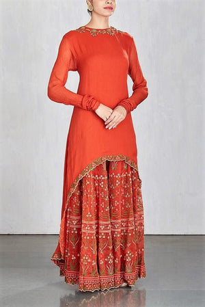 Buy bright red embroidered sharara with high low kurta online in USA. Make a captivating fashion statement with a range of Indian designer dresses from Pure Elegance clothing store in USA. If you are looking for online shopping, then look to our online store for a stunning collection of designer lehengas, Indian clothing and much more.-side