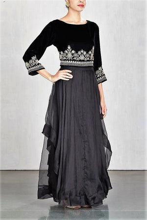 Buy black embroidered velvet crop top with skirt online in USA. Make a captivating fashion statement with a range of Indian designer dresses from Pure Elegance clothing store in USA. If you are looking for online shopping, then look to our online store for a stunning collection of designer lehengas, Indian clothing and much more.-side