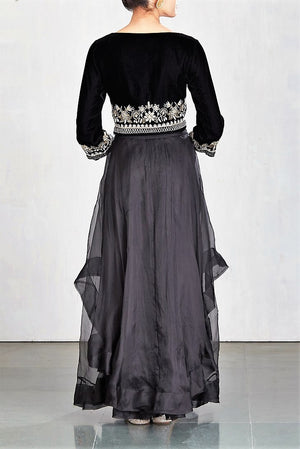 Buy black embroidered velvet crop top with skirt online in USA. Make a captivating fashion statement with a range of Indian designer dresses from Pure Elegance clothing store in USA. If you are looking for online shopping, then look to our online store for a stunning collection of designer lehengas, Indian clothing and much more.-back