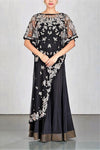 Shop black embroidered net poncho with chiffon sharara online in USA. Make a captivating fashion statement with a range of designer dresses from Pure Elegance clothing store in USA. If you are looking for Indian designer clothes online, then look to our online store for a stunning collection of Anarkali dresses, wedding lehengas and much more.-full view