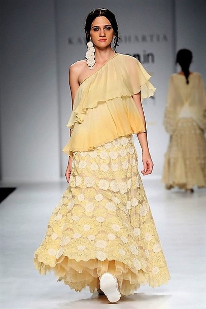 Buy yellow ombre one shoulder top with embroidered skirt online in USA. Make a captivating fashion statement with a range of designer dresses from Pure Elegance clothing store in USA. If you are looking for Indian designer clothes online, then look to our online store for a stunning collection of Anarkali dresses, wedding lehengas and much more.-full view