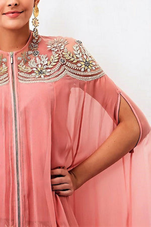 Shop pink hi-low cape with paneled sharara pants online in USA. Keep your style perfect with a stylish range of Indian designer clothes from Pure Elegance fashion store in USA. If you want to shop for Indian clothes online, then browse through our online store and shop at the comfort of your home.-cape