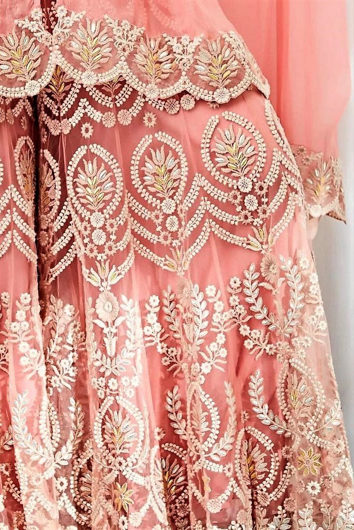 Shop pink hi-low cape with paneled sharara pants online in USA. Keep your style perfect with a stylish range of Indian designer clothes from Pure Elegance fashion store in USA. If you want to shop for Indian clothes online, then browse through our online store and shop at the comfort of your home.-embroidery