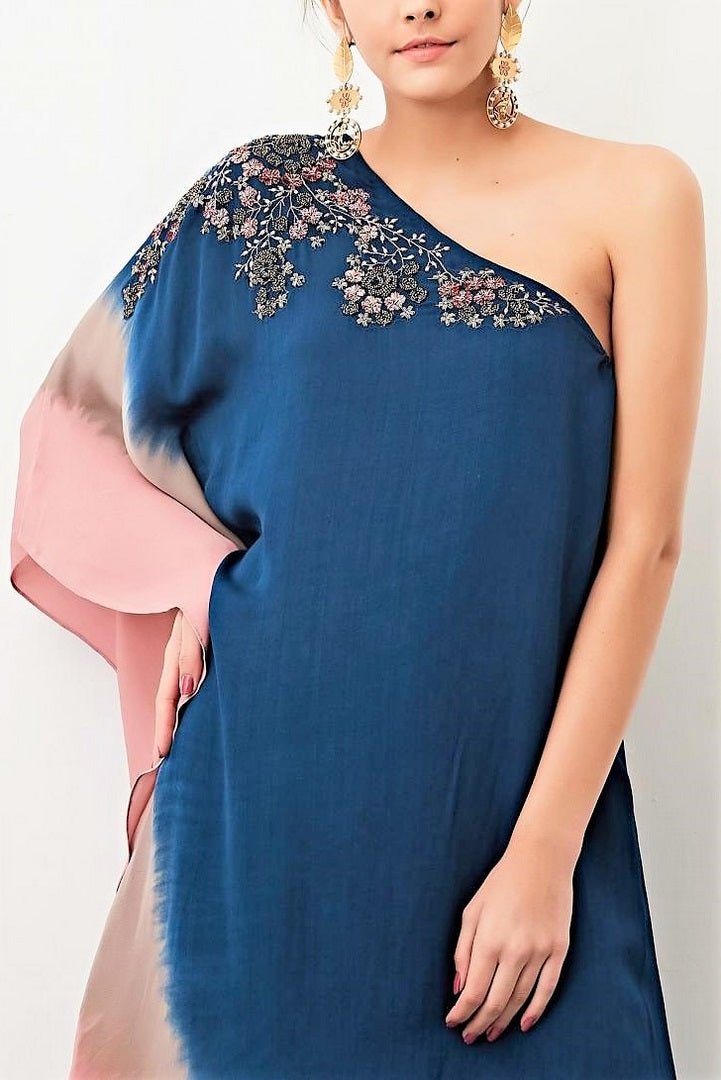 Shop navy ombre one-shoulder dress with black pearl embroidery online in USA. Keep your style perfect with a stylish range of Indian designer clothes from Pure Elegance fashion store in USA. If you want to shop for Indian clothes online, then browse through our online store and shop at the comfort of your home.-one shoulder