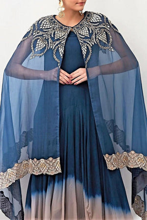 Buy navy embroidered front open cape with ombre draped dress online in USA. Keep your style perfect with a stylish range of Indian designer clothes from Pure Elegance fashion store in USA. If you want to shop for Indian clothes online, then browse through our online store and shop at the comfort of your home.-cape