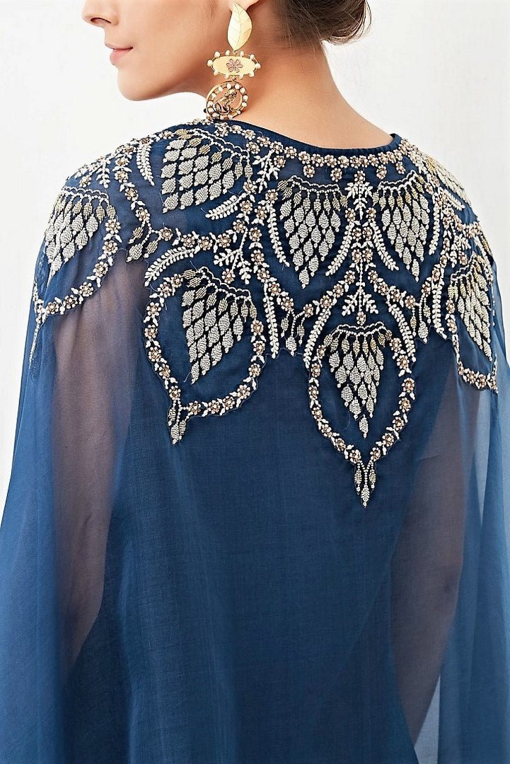 Buy navy embroidered front open cape with ombre draped dress online in USA. Keep your style perfect with a stylish range of Indian designer clothes from Pure Elegance fashion store in USA. If you want to shop for Indian clothes online, then browse through our online store and shop at the comfort of your home.-back embroidery