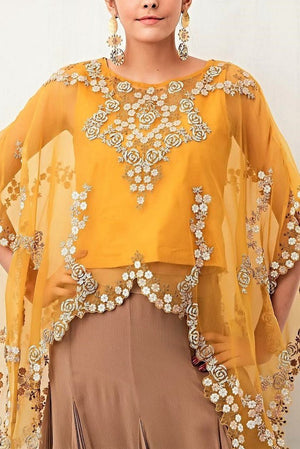 Buy mango yellow hand embroidered poncho with balloon skirt online in USA. Keep your style perfect with a stylish range of Indian designer clothes from Pure Elegance fashion store in USA. If you want to shop for Indian clothes online, then browse through our online store and shop at the comfort of your home.-poncho
