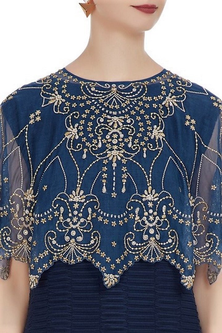 Buy designer navy embroidered cape with hi-low dress online in USA. Keep your style perfect with a stylish range of Indian designer dresses from Pure Elegance fashion store in USA. If you want to shop for Indian clothes online, then browse through our online store and shop at the comfort of your home.-cape