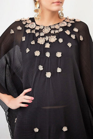 Shop black georgette poncho with 3D floral embroidery online in USA. Keep your style perfect with a stylish range of Indian designer dresses from Pure Elegance fashion store in USA. If you want to shop for Indian clothes online, then browse through our online store and shop at the comfort of your home.-poncho