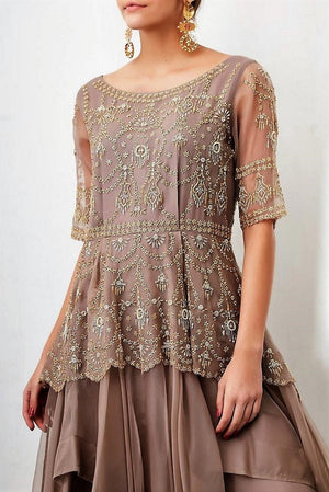 Shop designer grey embroidered peplum chiffon long dress online in USA. Keep your style perfect with a stylish range of Indian designer dresses from Pure Elegance fashion store in USA. If you want to shop for modern Indian clothing online, then browse through our online store and shop at the comfort of your home.-top