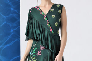 Shop bottle green embroidered layered frills gown online in USA at Pure Elegance. Make your wardrobe an eclectic mix of alluring silhouettes and colors with a range of Indian designer clothes available at our clothing store in USA. -top