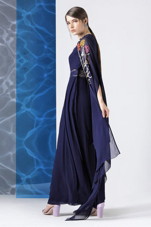Buy navy embroidered jumpsuit with embroidered cape online in USA from Pure Elegance. Make your wardrobe an eclectic mix of alluring silhouettes and colors with a range of Indian designer clothes available at our clothing store in USA. -back