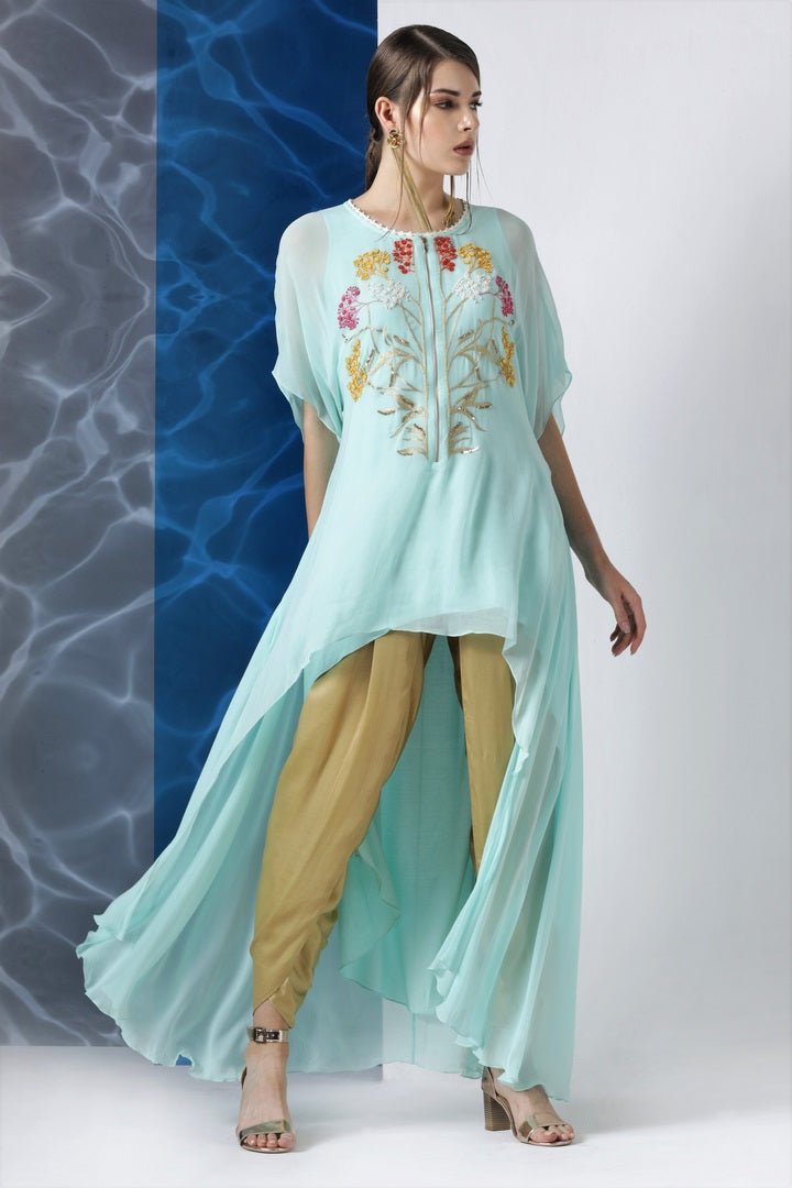 Buy sky blue embroidered asymmetric tunic online in USA from Pure Elegance. Make your wardrobe an eclectic mix of alluring silhouettes and colors with a range of Indian designer clothes available at our clothing store in USA. -full view